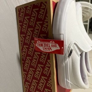 Brand new and never worn white slip on pro vans